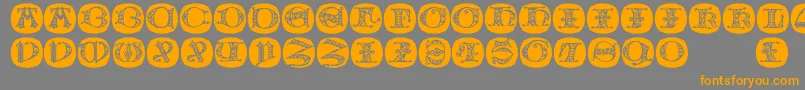 Uncialbuttonsa Font – Orange Fonts on Gray Background