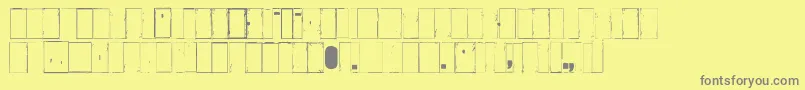 フォントIkhiooglawithout – 黄色の背景に灰色の文字