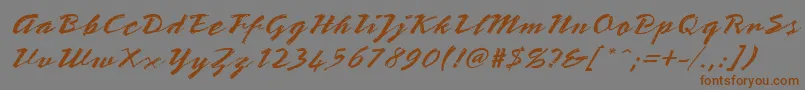 フォントStTeresitaScript – 茶色の文字が灰色の背景にあります。