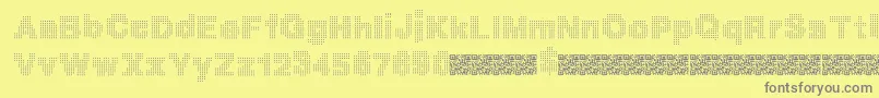 Megabits Font – Gray Fonts on Yellow Background