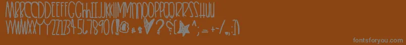 Heartkeeper Font – Gray Fonts on Brown Background