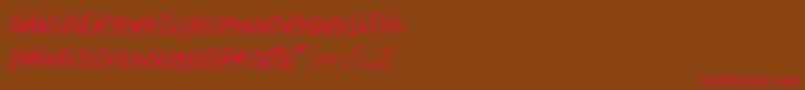 フォントCrosspatchers – 赤い文字が茶色の背景にあります。