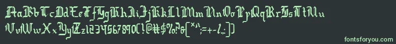 フォントRedcoatc – 黒い背景に緑の文字