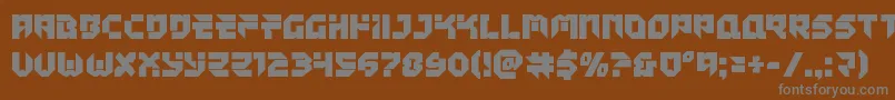 Tokyodrifterstaight-fontti – harmaat kirjasimet ruskealla taustalla