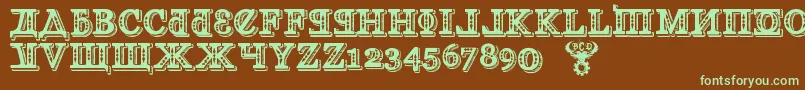 フォントKremlinGeorgianI3D – 緑色の文字が茶色の背景にあります。