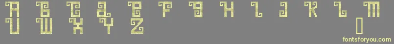 QuetzalDemo Font – Yellow Fonts on Gray Background