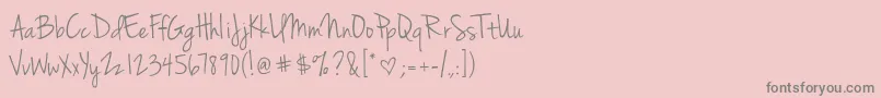 フォントJennasue – ピンクの背景に灰色の文字