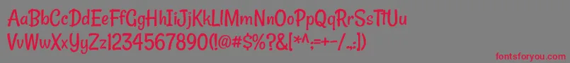 RanchoRegular Font – Red Fonts on Gray Background
