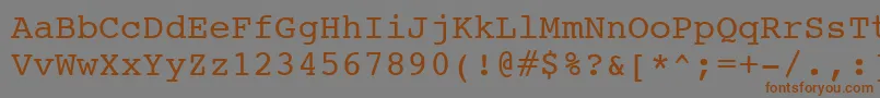 CourierSwa-fontti – ruskeat fontit harmaalla taustalla