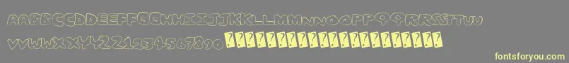 Fancom Font – Yellow Fonts on Gray Background