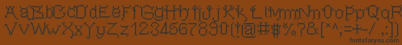 Pixeldevilsdeal Font – Black Fonts on Brown Background