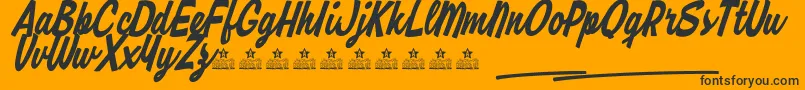 RipmonstersPersonalUse Font – Black Fonts on Orange Background