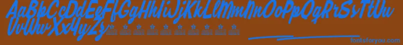 RipmonstersPersonalUse-fontti – siniset fontit ruskealla taustalla