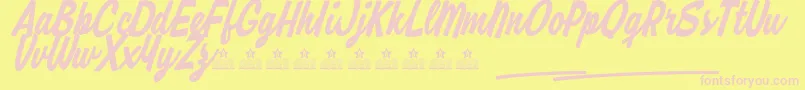 Czcionka RipmonstersPersonalUse – różowe czcionki na żółtym tle