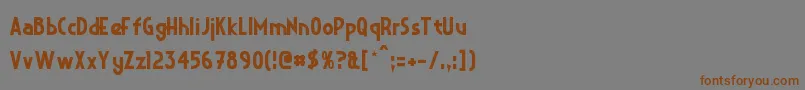 フォントCrystalDeco – 茶色の文字が灰色の背景にあります。