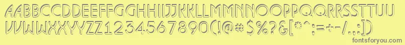 フォントALanceteshd – 黄色の背景に灰色の文字