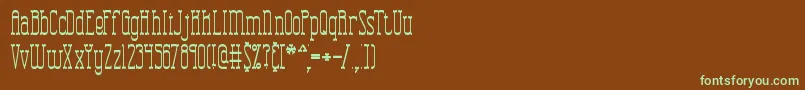 フォントCombustt – 緑色の文字が茶色の背景にあります。