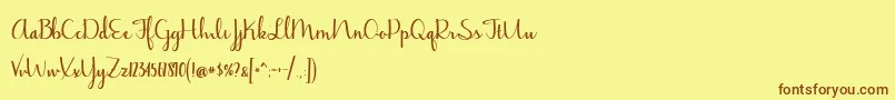 BmdJasmineReminiscentseBold Font – Brown Fonts on Yellow Background