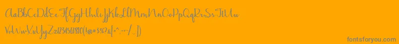 BmdJasmineReminiscentseBold-Schriftart – Graue Schriften auf orangefarbenem Hintergrund