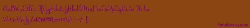 BmdJasmineReminiscentseBold Font – Purple Fonts on Brown Background
