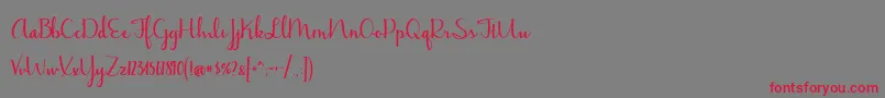 BmdJasmineReminiscentseBold-Schriftart – Rote Schriften auf grauem Hintergrund