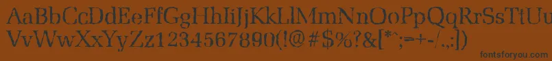 フォントMarseillerandomRegular – 黒い文字が茶色の背景にあります