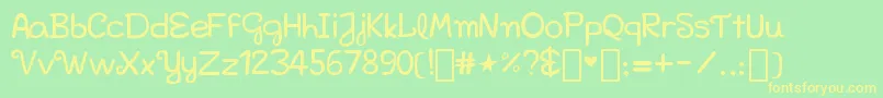 Bellakfont Font – Yellow Fonts on Green Background