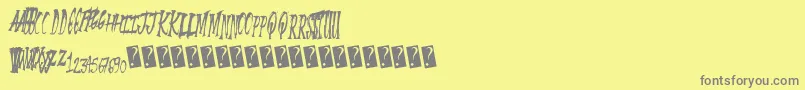 フォントSummerscare – 黄色の背景に灰色の文字