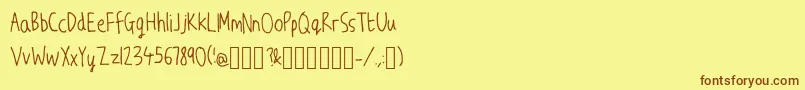 JwScript Font – Brown Fonts on Yellow Background
