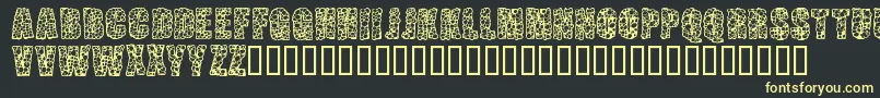 フォントPustuleBold – 黒い背景に黄色の文字