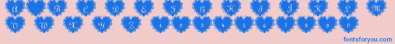 SummersLacehearts-Schriftart – Blaue Schriften auf rosa Hintergrund