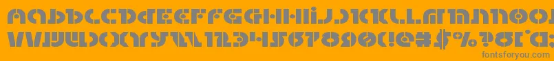 Questlokexpand-Schriftart – Graue Schriften auf orangefarbenem Hintergrund