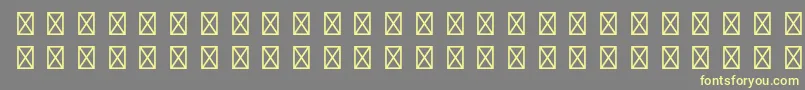 フォントGamepiltstdEnglishcards – 黄色のフォント、灰色の背景