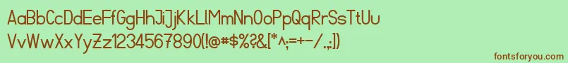FibelSued-fontti – ruskeat fontit vihreällä taustalla