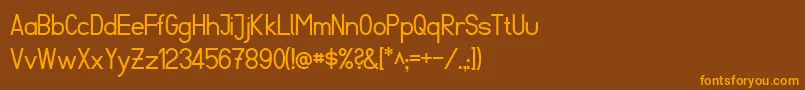 FibelSued Font – Orange Fonts on Brown Background