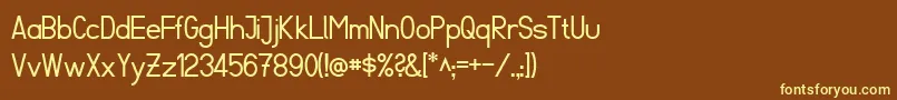 FibelSued-fontti – keltaiset fontit ruskealla taustalla