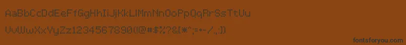 Шрифт LcddotTr – чёрные шрифты на коричневом фоне
