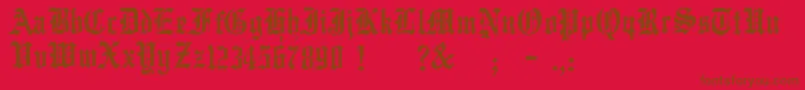 Fonte JmhWulfila – fontes marrons em um fundo vermelho