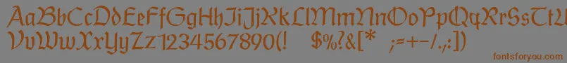 フォントPostmodernefraktur – 茶色の文字が灰色の背景にあります。