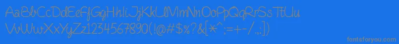 Czcionka FinelinerScript – szare czcionki na niebieskim tle