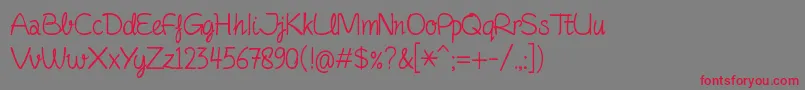 FinelinerScript-fontti – punaiset fontit harmaalla taustalla