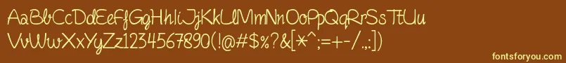 fuente FinelinerScript – Fuentes Amarillas Sobre Fondo Marrón