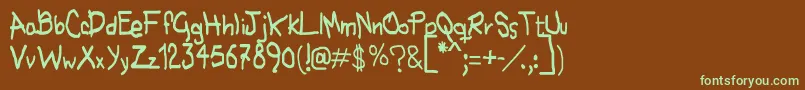 フォントNohubotiempo – 緑色の文字が茶色の背景にあります。