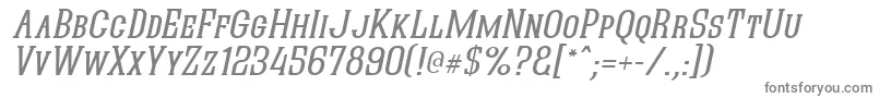 QuasticKapsItalic-fontti – harmaat kirjasimet valkoisella taustalla