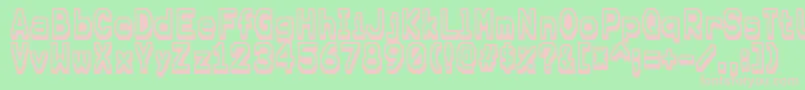 Karma Font – Pink Fonts on Green Background