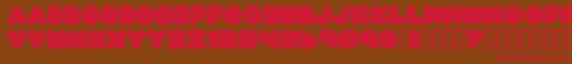 Automani Font – Red Fonts on Brown Background