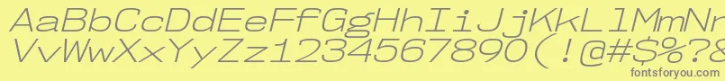 フォントNk57MonospaceExLtIt – 黄色の背景に灰色の文字