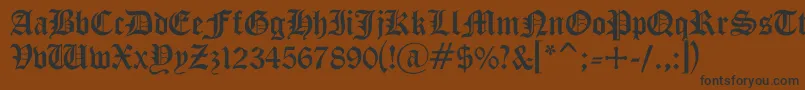 フォントGothicc – 黒い文字が茶色の背景にあります