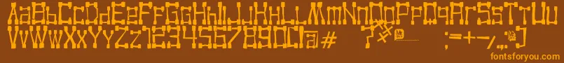 KvadroRandom2 Font – Orange Fonts on Brown Background