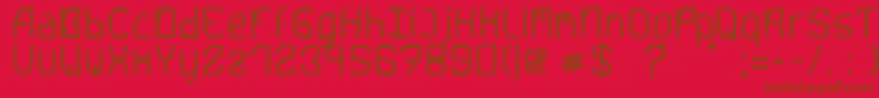 Saturn5Bold-Schriftart – Braune Schriften auf rotem Hintergrund